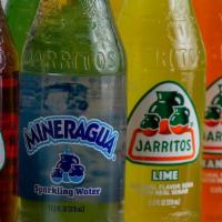 Jarritos** · Made with real cane sugar and traditional Mexican flavors.