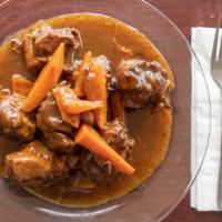Stew Chicken · Slow cooked soup.