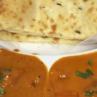 Butter Chicken · Boneless tandoori chicken simmered in a sauce of fresh tomatoes, and creamy sauce.