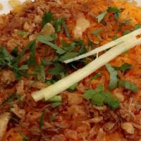 Chicken Biryani · Saffron Flavored basmati rice Cooked with boneless pieces of chicken, over low fire with Ind...