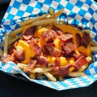 Bacon Cheese Fries · Fresh cut french fries topped with bacon bits and your choice of cheese.