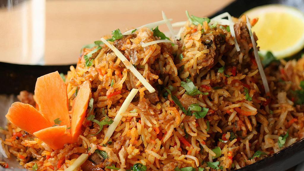 Lamb Biryani · Spiced lamb cooked with saffron flavor basmati rice and traditional spices