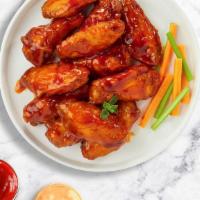 Buffalo Blaze Wings · Crispy wings fried until golden brown, and tossed in buffalo sauce. Served with your choice ...
