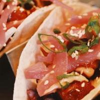 Pork Belly Tacos · red cabbage slaw, pickled red onion, korean bbq sauce, sriracha aioli, scallions