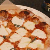 Margherita Pizza · fresh mozzarella, basil, pecorino romano, 
tomato sauce, garlic oil