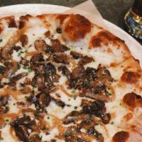 Garcia Pizza · mushrooms, caramelized onions, mozzarella, pecorino romano, garlic oil