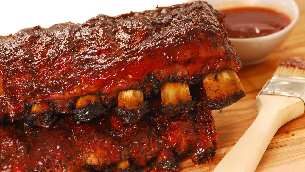 Full Rack St Louis Ribs · Full rack of ribs cooked with our sweet and savory BBQ sauce. 22 oz.