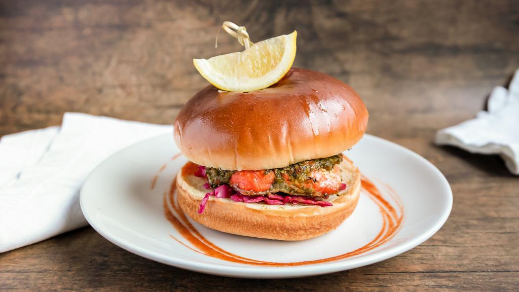 Salmon Chimichurri Burger · Sous vide salmon, chimichurri, spicy mayo, pickled cabbage over a brioche bun