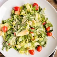 Caesar Salad · Romaine, grape tomatoes, parmesan, garlic croutons, dried tomato basil Caesar dressing