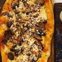 Kennett Square Mushroom Pizza · whipped ricotta, roasted garlic, balsamic vinegar