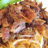 Pad Thai Duck · Rice stick noodles, duck, egg, dried bean curd, scallion, bean sprouts and crushed peanut.
