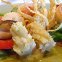 Emerald Sea · Sauteed seafood combination with green peas, zucchini, string bean, bell pepper and green cu...