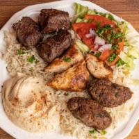 Mixed Platter · chicken taouk, ground beef kafta & lamb shish kabob, served with hummus, house salad & basma...