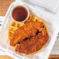 Chicken & Waffle · Waffle topped with two hand breaded chicken tenders. Served with syrup