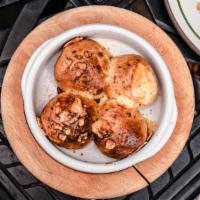 Cheddar And Scallion Parker House Rolls · maple butter