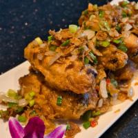 Spicy Salt & Pepper Chicken Wings · Hot and spicy.