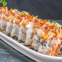 White Tiger Maki · Raw and spicy. Spicy tuna inside, torched white tuna on top with taro, tobiko, scallion, and...