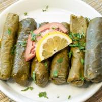 Warak Enab Vegetarian · A tasty mix of pasley,onions,tomatoes,rice and hint of lemon wrapped in grape leaves (Gluten...