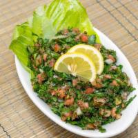 Tabouli · Fresh parsley, mint, wheat bulgur, ripe tomatoes, onions, lemon and olive oil