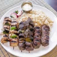 Mixed Grill Platter · Combination of Chicken shish taouk, kafta kebab, and beef tenderloins served with rice pilaf