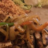 Blackened Chicken Fajita · Served with Hot Flour Tortillas, Sauteéd Onions and Peppers Mexican Rice, Refried Beans, Che...