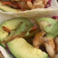 Seared Shrimp Tacos (3) · Red Pepper, Ancho Chili, Pickled Cabbage, Salsa Verde, Avocado