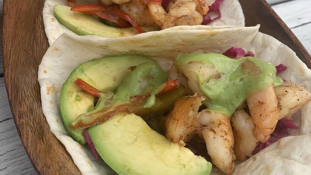 Seared Shrimp Tacos (3) · Red Pepper, Ancho Chili, Pickled Cabbage, Salsa Verde, Avocado