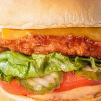 Elevation Chicken Sandwich · Cheddar cheese, lettuce, tomato, and crispy dill pickles with Elevation Sauce.