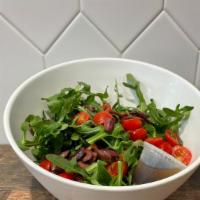 Side Salad* · Baby arugula, cherry tomatoes, kalamata olives and balsamic dressing.