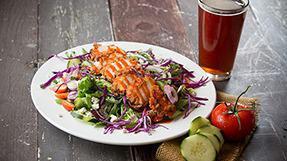 Brewhouse Buffalo Chicken Salad · Fresh greens, crisp romaine, cucumber, tomatoes, red and green onions, with blue cheese and ...