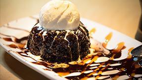 Molten Chocolate Thingy · Same chocolate warm melty thingy only ours has a ganache filling, served with a scoop of van...