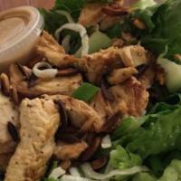 Chinese Salad · Fresh crispy lettuce, diced scallions, Chinese noodles, roasted almonds, chicken breast and ...
