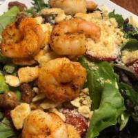 Grilled Shrimp Spinach Salad · Baby spinach, bacon, croutons, red onions, hard boiled egg, mushrooms and homemade poppy see...