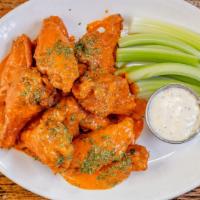 Buffalo Wings · Crispy fried & tossed in our homemade buffalo sauce, with celery & bleu cheese dressing.