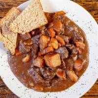 Guinness Beef Stew · Root vegetables & tender chunks of choice beef, in a hearty Guinness broth.