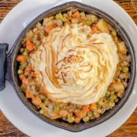 Shepherds Pie · Traditional beef, carrots, onions, peas & corn, served in a crock, topped with golden mashed...