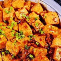 General Tso'S Tofu(Combination Platters)左宗豆腐+春卷 · Hot and spicy.Served with pork fried rice and  Egg Roll