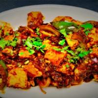 Chilli Paneer · Cottage cheese sautéed with soya, onions, green chilies, herbs, and exotic Indian spices.