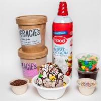 Sundae Kit · Includes two pints, 4 oz fudge, 4oz M&Ms, 2 oz sprinkles, 1 can whipped cream.