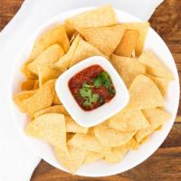 Chips & Salsa · Small bag of chips and 3.25 oz salsa