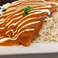 Enchiladas · Baked flour tortillas stuffed with cheese and your choice of chicken, beef, or vegetables to...