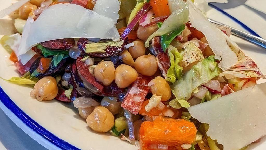 Chopped Antipasti Salad* · Romaine, radicchio, Tuscan salami, pecorino, pepperoncini, kalamata olive, red onion, garbanzo beans, roasted red peppers all tossed in a red wine vinegar dressing