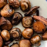 Side Roasted Mushrooms* · Button, shiitake, and trumpet royale mushrooms are roasted with shallots, thyme, garlic and ...