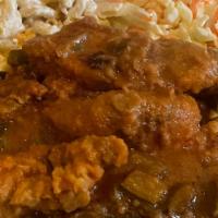 Brown Stew Chicken Platter · Served with your choice of peas and rice or noodles. And side selections include coleslaw, p...