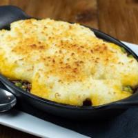 Shepherd'S Pie · Ground beef, carrots, peas, onions and herbs in a rich brown gravy, topped with creamy potat...