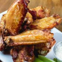 Classic Wings · Buffalo with blue cheese dressing and celery guinness bbq with buttermilk ranch dressing hon...