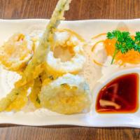 (Ap) Vegetable Tempura · Fresh seasonal veggie deep fried in light batter served with tempura sauce. Battered and fri...