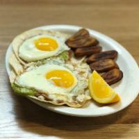Huevos Rancheros* · Two eggs any style with tomatillo ranchero sauce, jack cheese,  . and refried beans on two c...