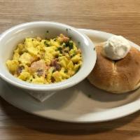 Smoked Salmon Scramble* · Smoked salmon scrambled with three eggs & chives. . Served with a bagel & cream cheese