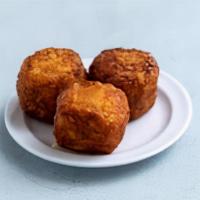 Mega Tots · Three jumbo tater tots stuffed with Cheddar cheese and fried to golden perfection. Handmade ...